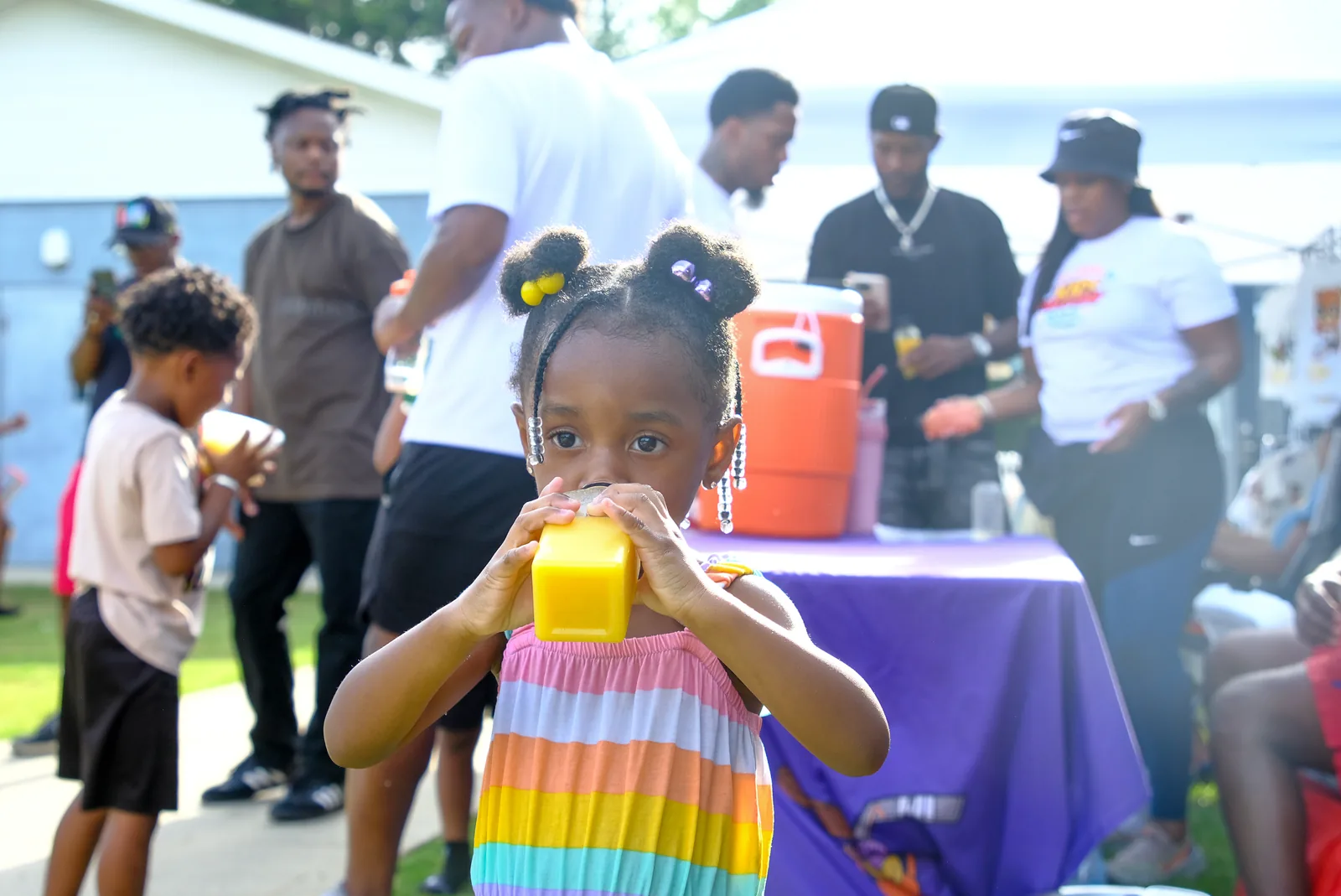 A family staying active and hydrated together
